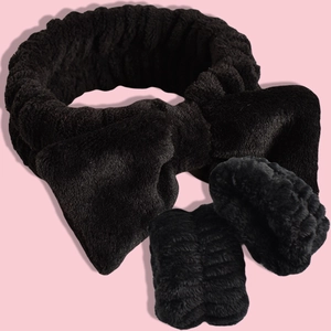 Three-piece black soft coral fleece set with bow headband and matching wrist washbands