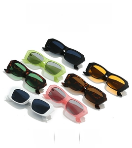 Diagonal array of vintage square frame sunglasses in assorted vibrant acetate colors