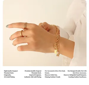Detail of 18k gold plated titanium steel OT buckle bracelet with freshwater pearl and square tag
