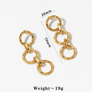 Detail view of golden triple hoop drop earrings showing dimensions 70mm by 20mm and weight