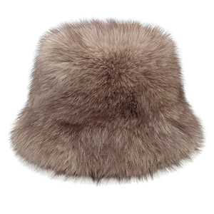 Detail of dark khaki long plush bucket hat showing the thick and fluffy wool texture