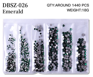 Detailed set of emerald crystal rhinestones in varied sizes for nail art decoration