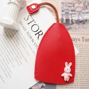 Red water-drop leather key cover with cute pink rabbit mascot and woven strap