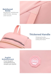 Detail of pink backpack showing reinforced shoulder straps, handle, and HSD logo