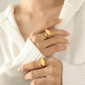 Minimalist irregular 18k gold plated stainless steel open rings on model for daily wear