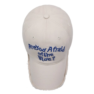 Vintage beige cotton baseball cap with blue embroidery and distressed brim details