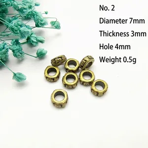 Detail of 7mm antique bronze floral spacer beads with 4mm hole for DIY jewelry making