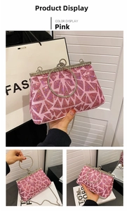Macro view of pink sequin clutch bag with crystal ring handle and metal chain strap