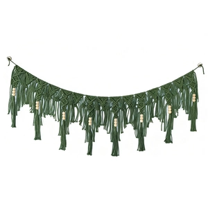 Handmade dark green macrame wall hanging with bohemian fringe and wood beads