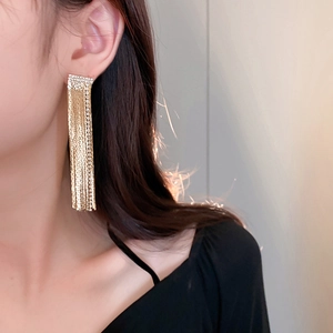 Elegant gold square tassel fringe drop earrings shown on model for length reference