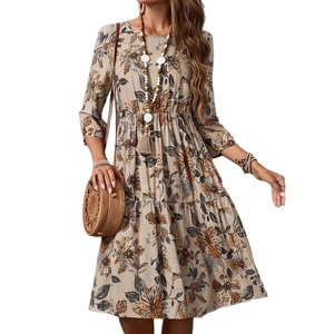 Detail of bohemian floral dress with vintage khaki prints and elastic waist design