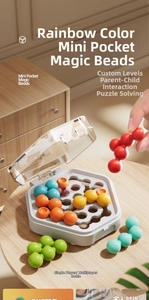 Macro detail of portable mini pocket magic beads puzzle game in colorful rainbow design