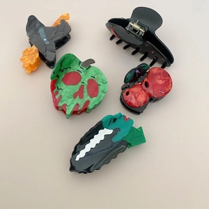Creative Halloween hair claw set featuring spooky pumpkin, skull and wizard hat designs