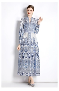 Detailed pattern of a vintage V-neck paisley long sleeve dress with waist cinching