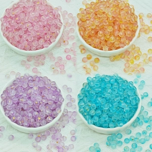 6mm and 8mm frosted glass beads in four pastel colors with gold glitter for DIY jewelry