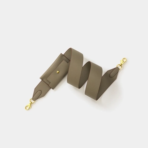 Taupe textured leather wide shoulder strap with gold metal swivel clasps and snap detail