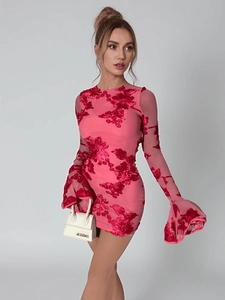 Detail of pink mini dress featuring red floral embroidery and mesh flare sleeves