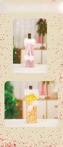 Detail of sequin wine bottle covers with faux fur trim and pompom ties for Christmas decor