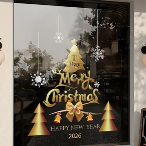 Golden Christmas tree and 2026 New Year static stickers on a glass window cafe door