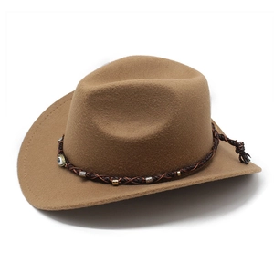Brown western cowboy hat with woven leather band featuring metal beads and evil eye charm