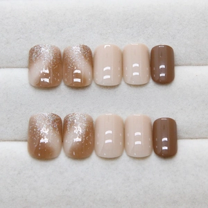 Brown gradient press-on nails with silver glitter and mocha short square design