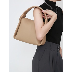 Minimalist large capacity leather pillow bag in beige, stylish tote and crossbody bag