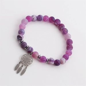 Beaded dreamcatcher bracelet with purple weathered stone and silver feather charms