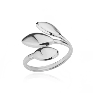 Macro detail of geometric silver leaf wrap ring with polished metallic finish