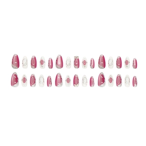 Pink cat eye press-on nails with silver metallic 3D bow design in almond shape