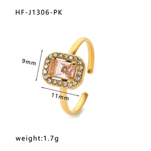 Detailed view of gold open ring with 9x11mm pink gemstone and pavé cubic zirconia