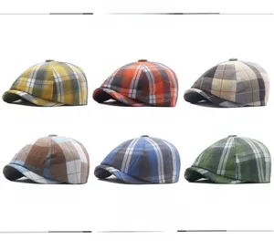 Matrix showing six colors of retro plaid beret hats including yellow, blue, and green