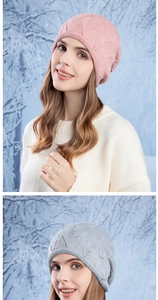 Detail of knitted slouchy beanie with hollow texture and bead accents in pink and grey