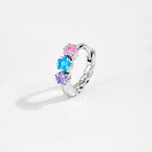 Detailed shot of S925 silver hoop earring with pink, blue, and purple star-shaped zircons