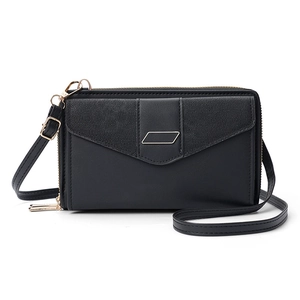 Detail of black PU leather crossbody phone bag showing woven texture and metal hardware