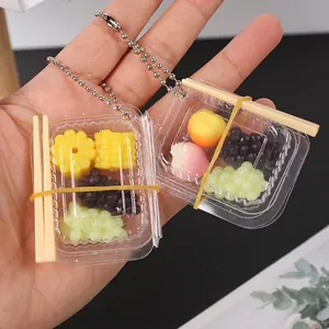 Mini fruit bento box keychain with realistic resin fruits and transparent display case