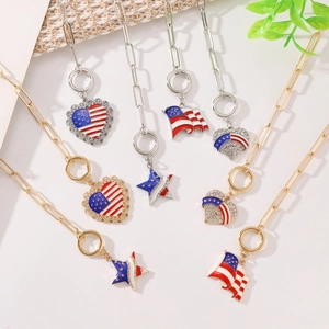 Detail of USA Flag heart and star pendants with red white blue enamel on paperclip chain