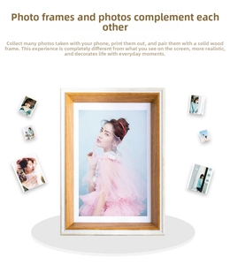 Close-up of a minimalist solid wood photo frame with various polaroid pictures displayed