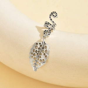 Detailed view of silver alloy ear cuff with leaf pendant for Christmas hair accessory