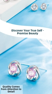 Macro detail of S999 silver flower earrings with pink and blue gemstone inlays