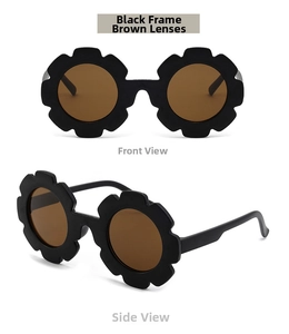Close-up of black flower-shaped kids' sunglasses with brown lenses from front and side view