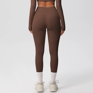 Back view of high-waist chocolate brown yoga pants showing ergonomic hip-lifting design