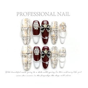 Luxury tweed press-on nail set in burgundy and white with pearls and 3D bows