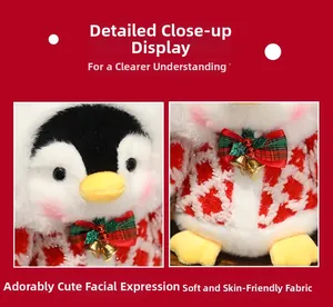Detail of cute penguin plush wearing a knit sweater and festive bowtie with small bell