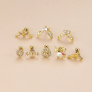 Set of 8 gold stainless steel cartilage studs with heart, crown, and zircon stones