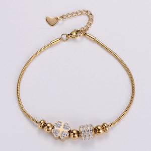 18k gold plated stainless steel snake chain bracelet with sparkling clover and heart charms