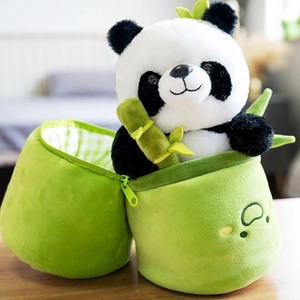 Cute panda plush toy inside a green bamboo shoot zipper storage bag with panda doll
