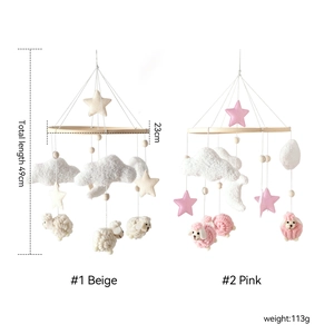 Detailed size measurement of beige and pink wooden baby crib mobiles with sheep charms
