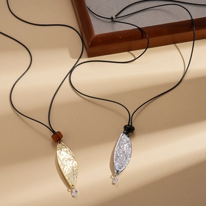 Retro leaf pendant necklace with hammer textured metal and elegant long leather cord