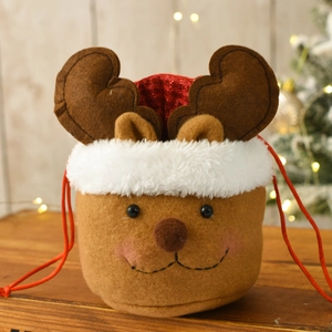 Detailed view of Christmas reindeer burlap drawstring gift bag with plush trim and red sequins