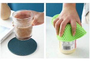 Detail of round honeycomb silicone mat used as a non-slip coaster and jar lid opener tool